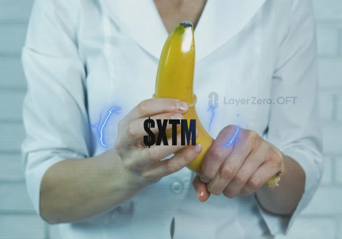 wXTM promotional image showing hands holding a banana, with $XTM text, LayerZero OFT branding, and blue electrical effects